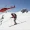 skier-in-red-descending-a-pristine-mountain-slope-2025-04-05-05-42-40-utc