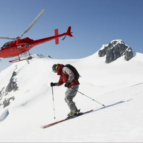 skier-in-red-descending-a-pristine-mountain-slope-2025-04-05-05-42-40-utc
